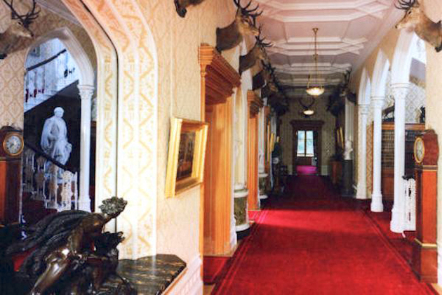 Inside Balmoral Castle Hall with Stag heads - Scene Therapy